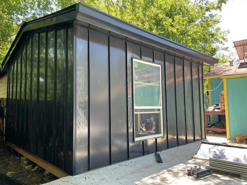 Black standing seam metal wall panels for Roof Inspection in Clover Creek