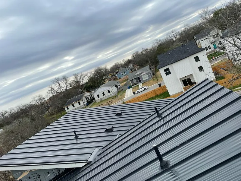 Standing seam metal roof panels with vents for Skylight Repair in Clover Creek
